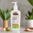 Kép 2/3 - Palmer's Kakaóvajas Masszázs Testápoló Striák Ellen - 250 ml 